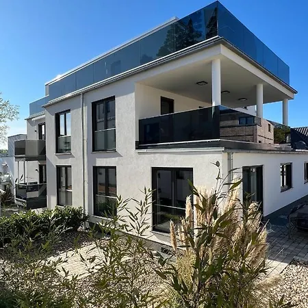 Апартаменты Suedstrandquartier, Cor Зеллин